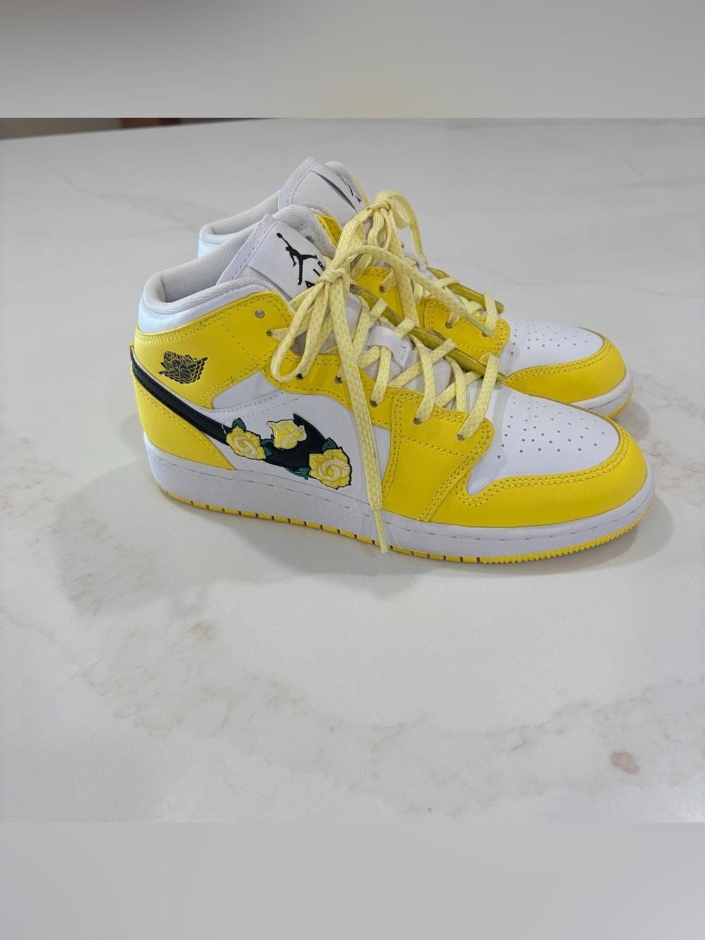 Air Jordan Kids Floral Patch Mid-Top Sneakers in Yellow and White